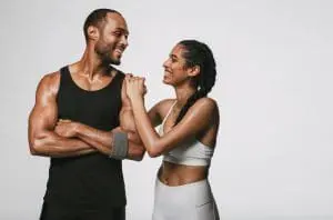 fit couple laughing